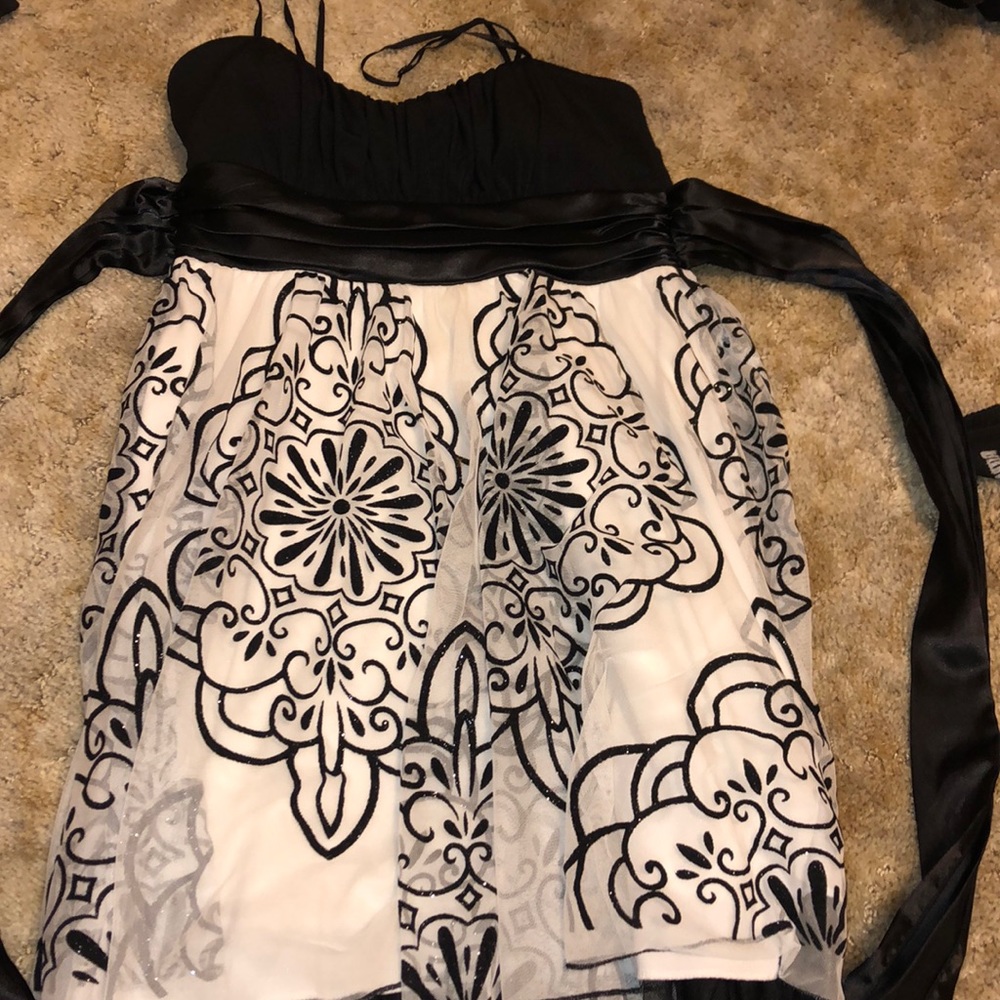 Black and white flowy, floral dress.